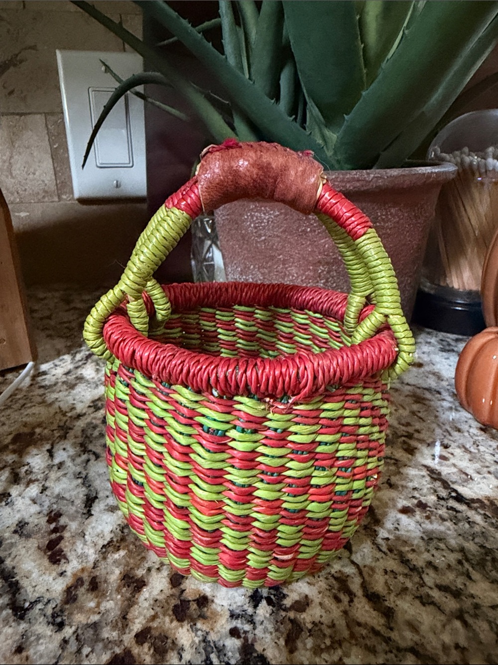 Handwoven Red and Lime Green Decorative Basket with Handle This is a mini basket